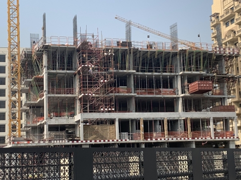 Residential &amp; Commercial Building 3B+G+7TYP+R